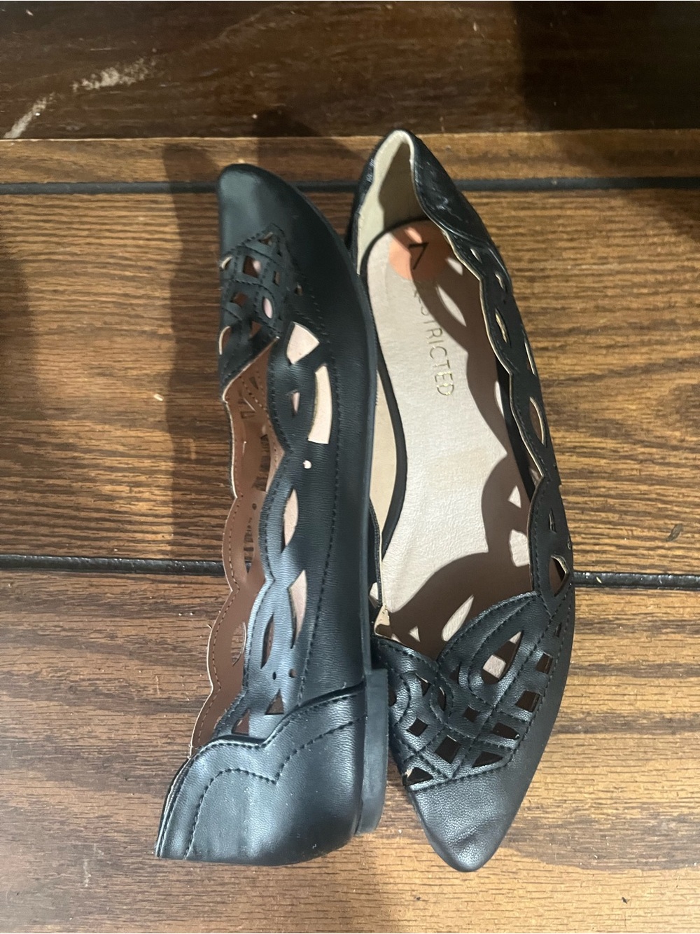 Restricted Black Laser-Cut Pointed-Toe Flats